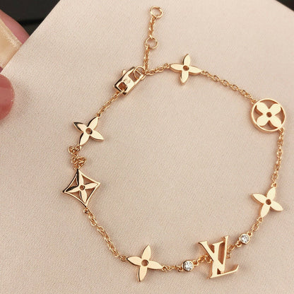 [Regalia jewelry]STAR AND SUN 7 MOTIFS GOLD BRACELET